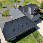 New Roof for 12,000 Square Foot Home Plus Skylights