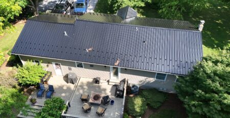 From Worn Asphalt Shingles to a Beautiful Black Metal Roof