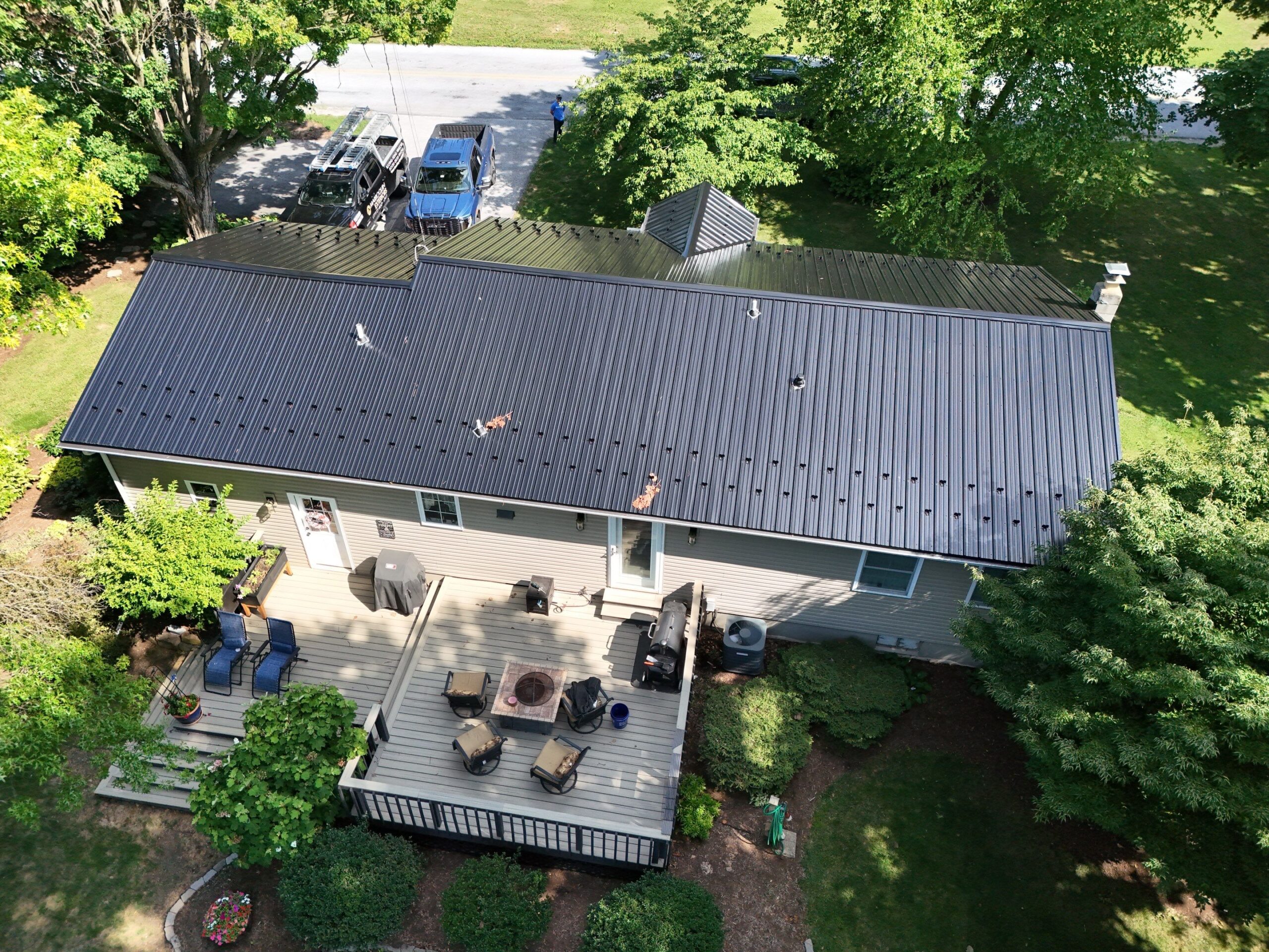 From Worn Asphalt Shingles to a Beautiful Black Metal Roof