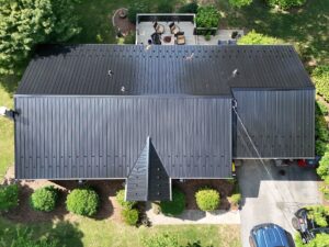 From Worn Asphalt Shingles to a Beautiful Black Metal Roof