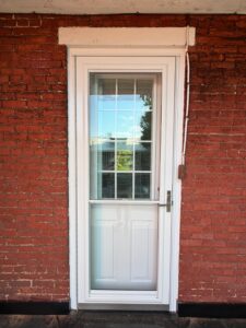 Solving Persistent Leaks with a New EPDM Porch Roof & Entry Door