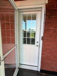 Solving Persistent Leaks with a New EPDM Porch Roof & Entry Door