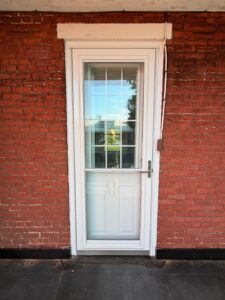 Solving Persistent Leaks with a New EPDM Porch Roof & Entry Door